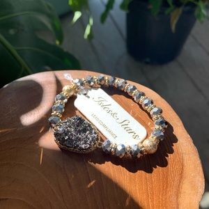 Silver and gold beaded bracelet with silver quartz pendant